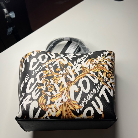 Brand new with tags Versace Jeans Couture
Black Mini Reversible Tote - Picture 2 of 6